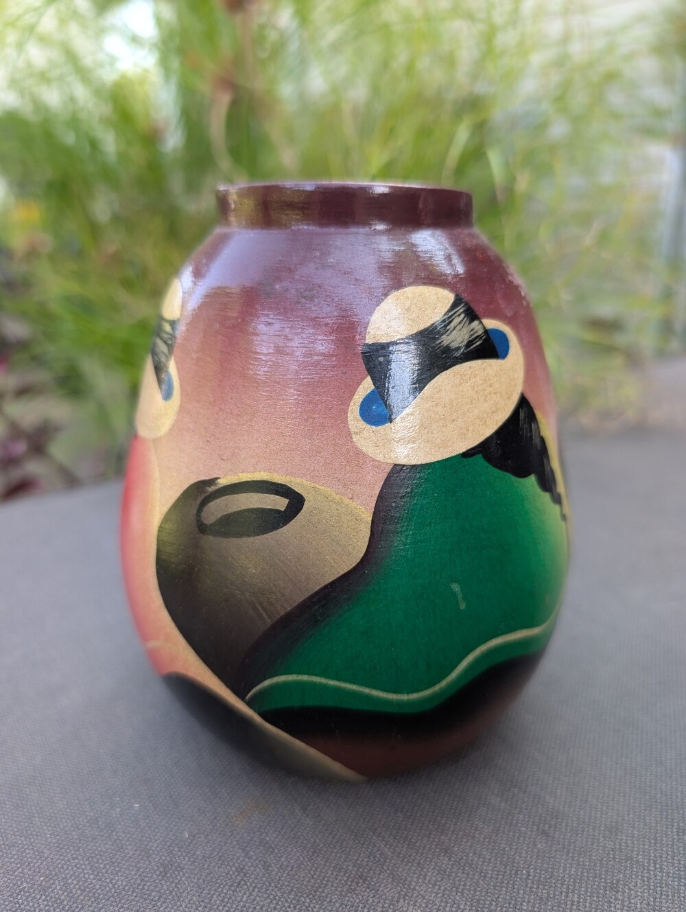 Hand-painted South American folk art pottery by Adalid.